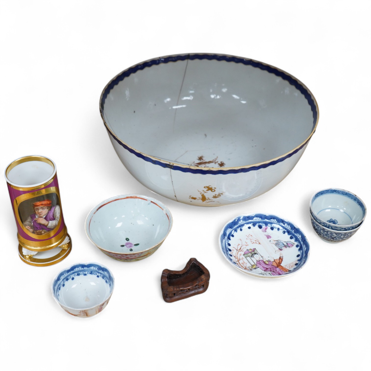An 18th/19th century Chinese tea bowl and saucer, a punch bowl, two tea bowls and a Paris porcelain vase, largest 31cm